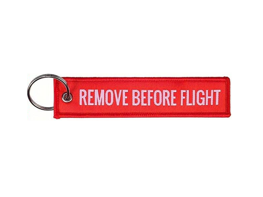 Remove Before Flight Rød printet