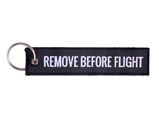 Remove Before Flight sort med hvid tekst