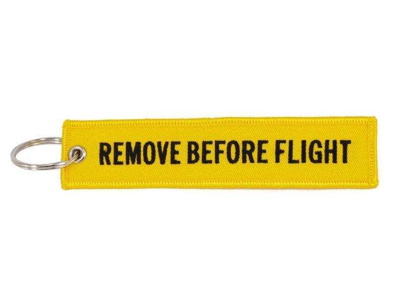 Remove Before Flight Yellow Black Text